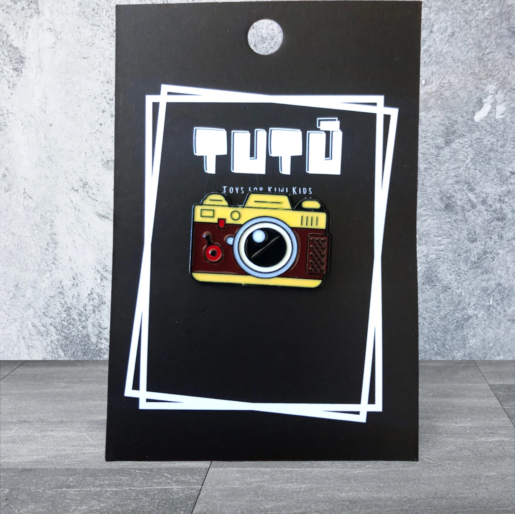 TT Brown Camera Pin
